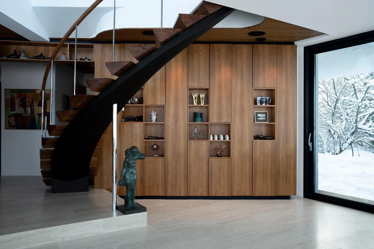 Custom business interior with staircase furniture elements