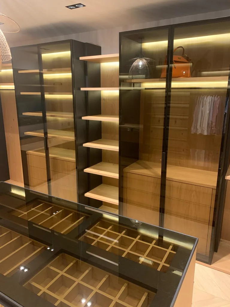 Turnkey custom furniture project in Glass Walk In Closet Island Custom Furniture by RPGroup